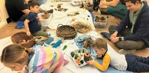 Group of children working on nature crafts at the Dunn Museum