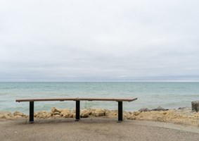 View of Lake Michigan and the skyline from a park bench at Fort Sheridan