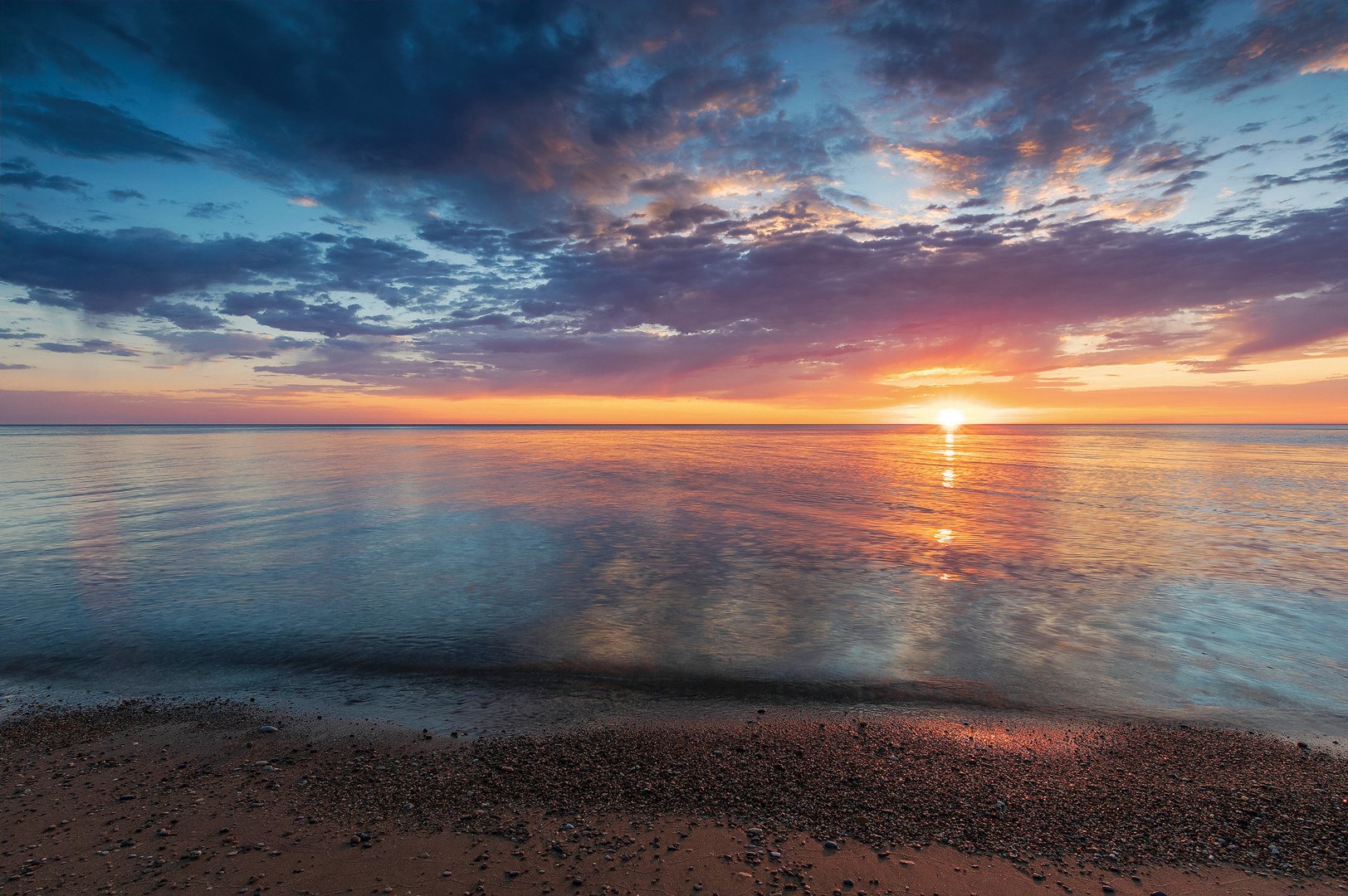 Sunset over the water at Openlands Lakeshore Preserve.