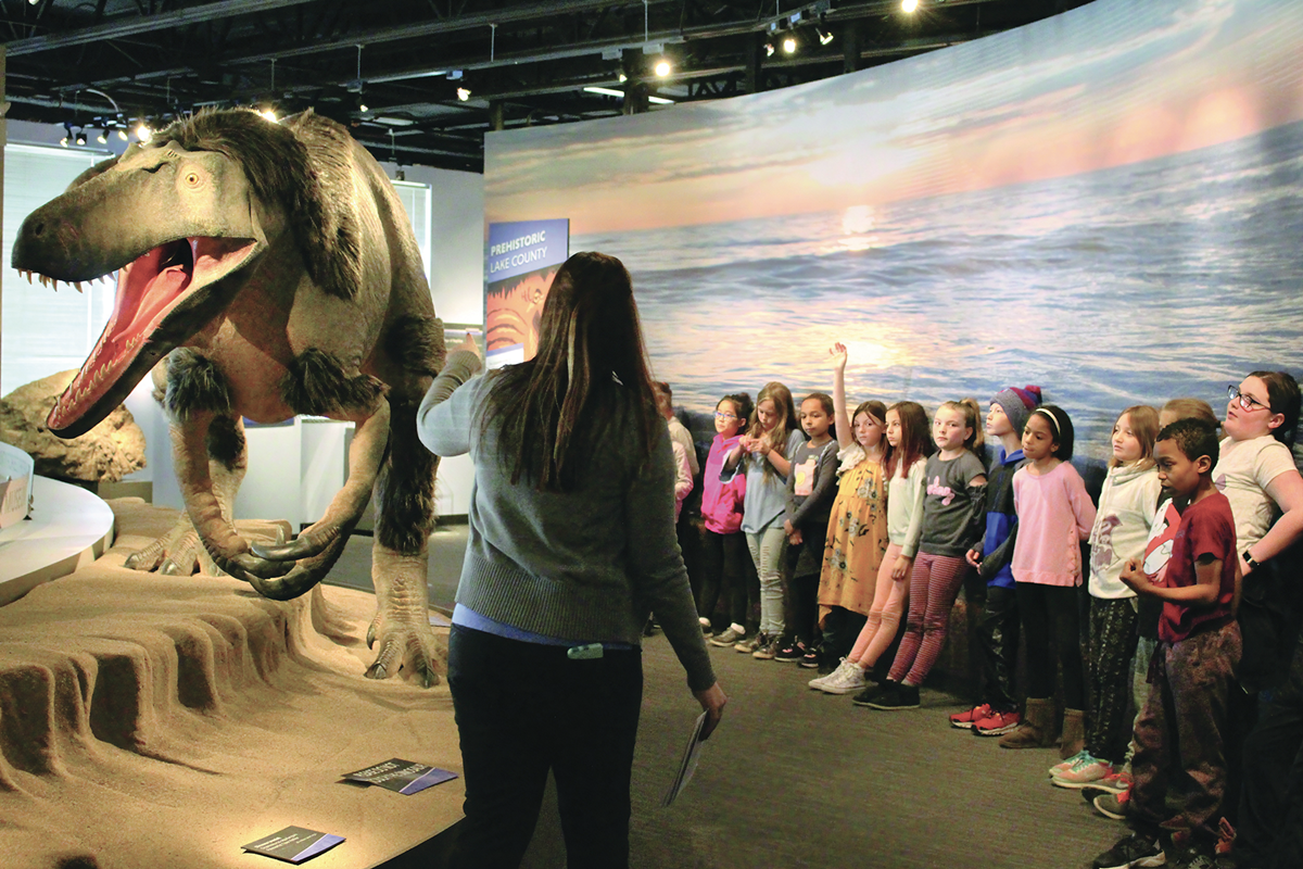 Instructor at Dunn Museum talking about dinosaurs